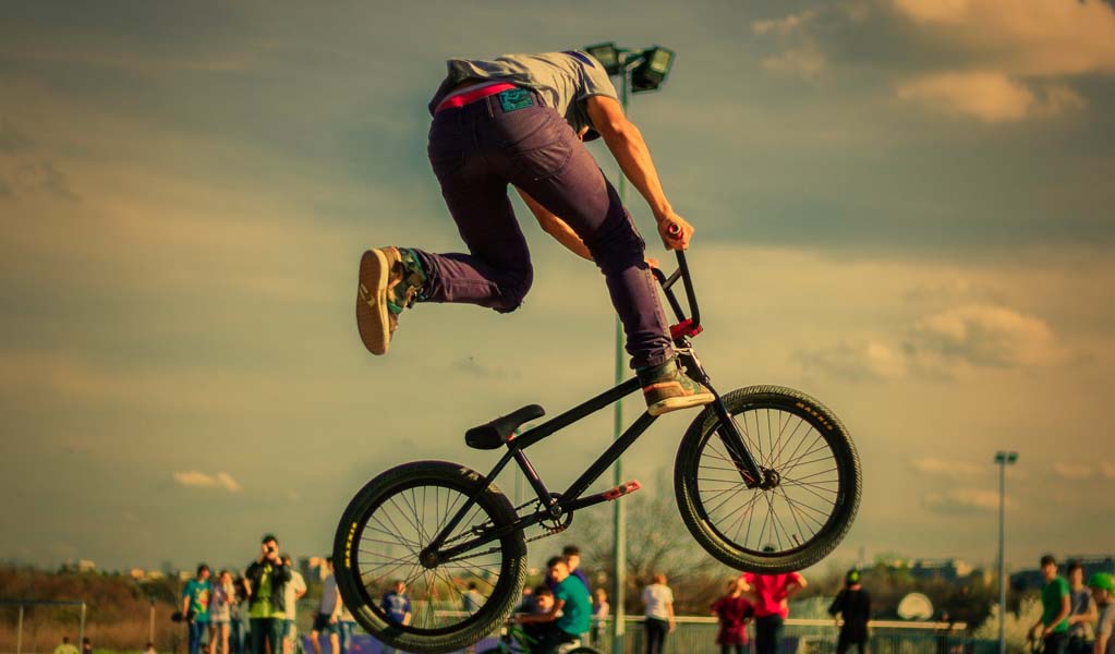 Boy doing Bicycle Stunt