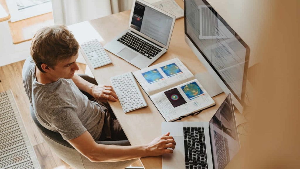 Man Using Computers