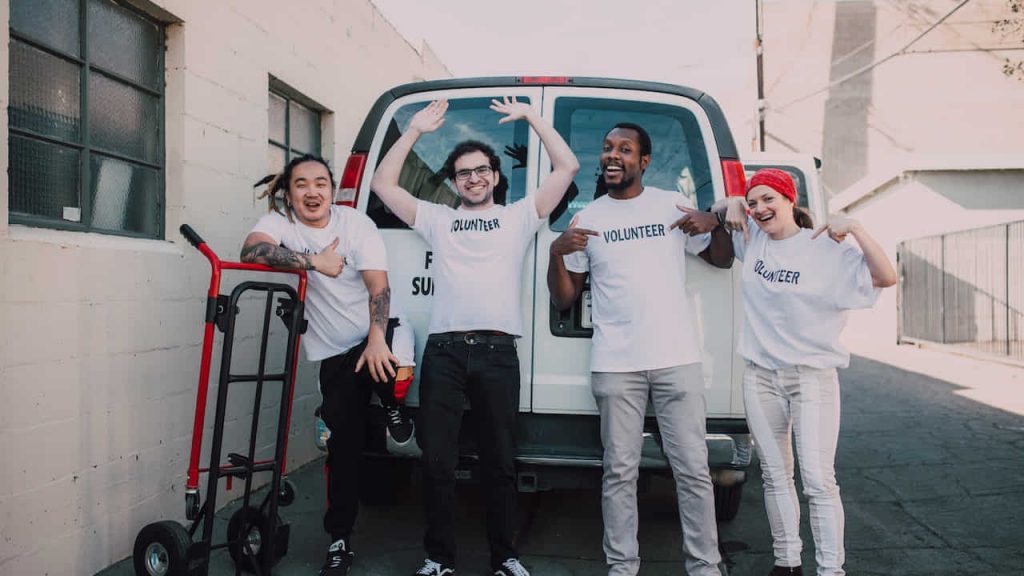 volunteers-group-wearing-white-company-uniforms