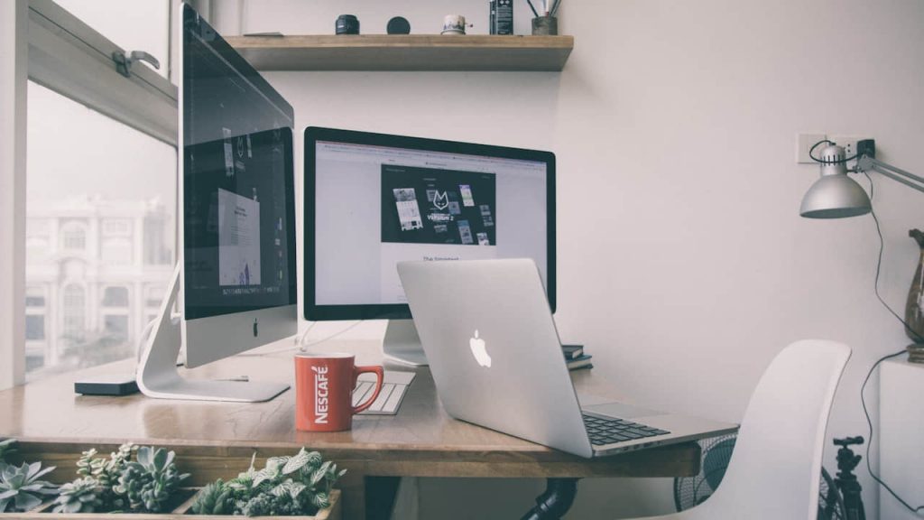 working table with personal computers