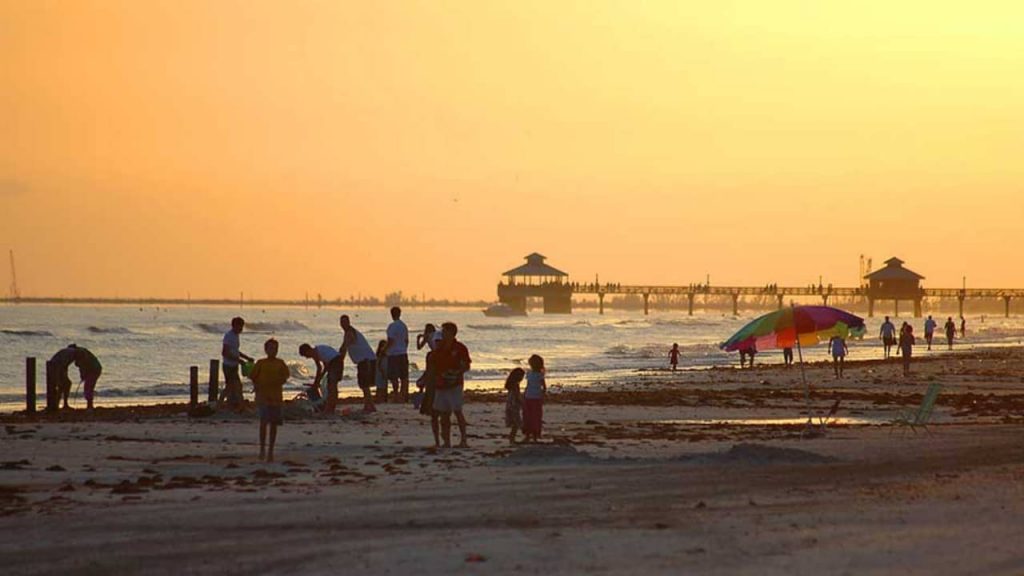 people enjoying at the beach