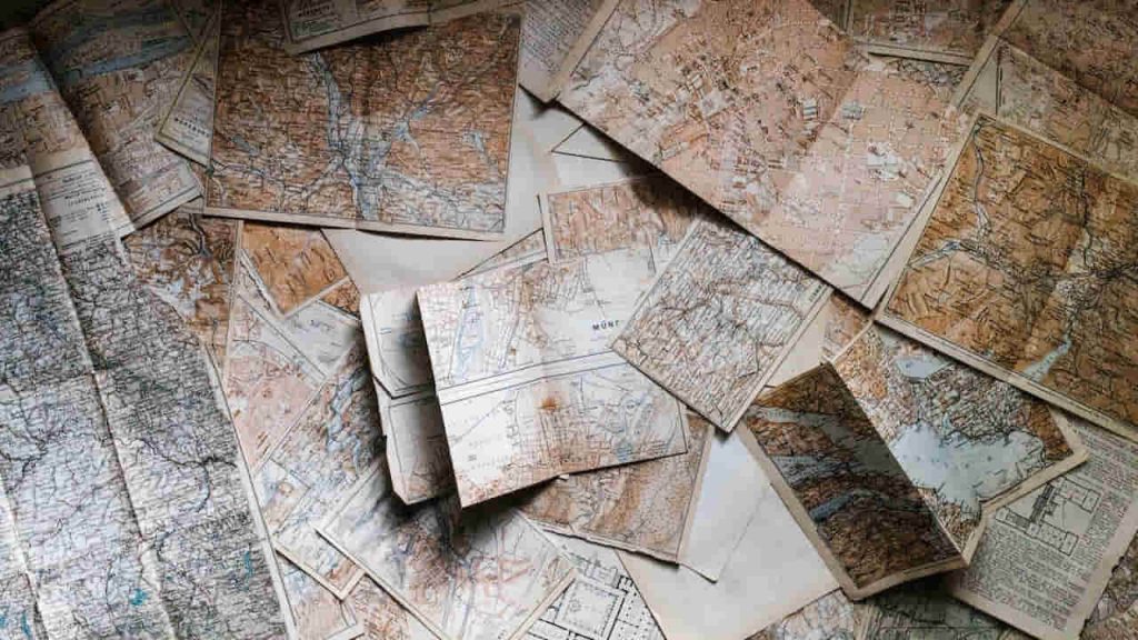 maps scattered all over the surface