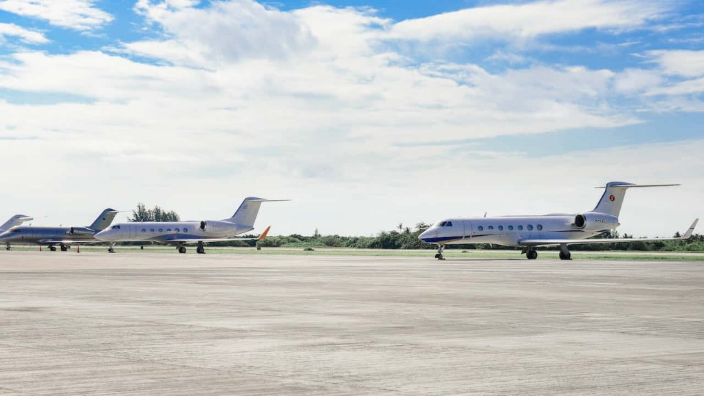 Three Parked Planes at the Airport