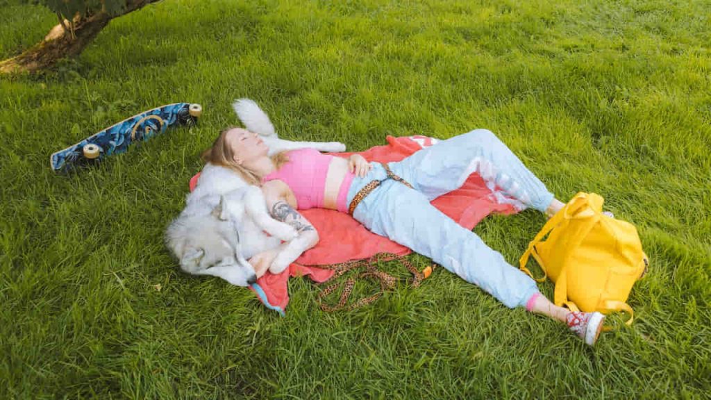 Woman Resting With her Dog