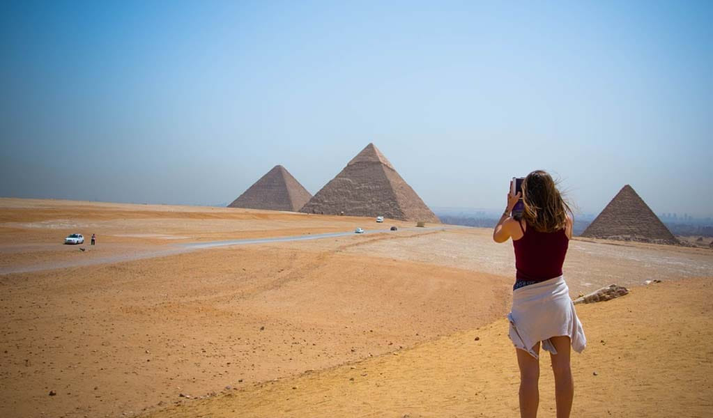 woman taking a photograph