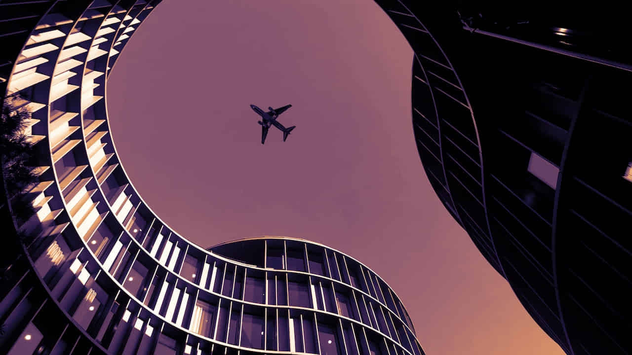 plane above the building in europe