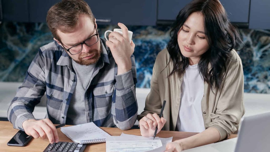 couple looking at their bills