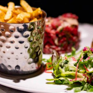 Salad and fries on a plate