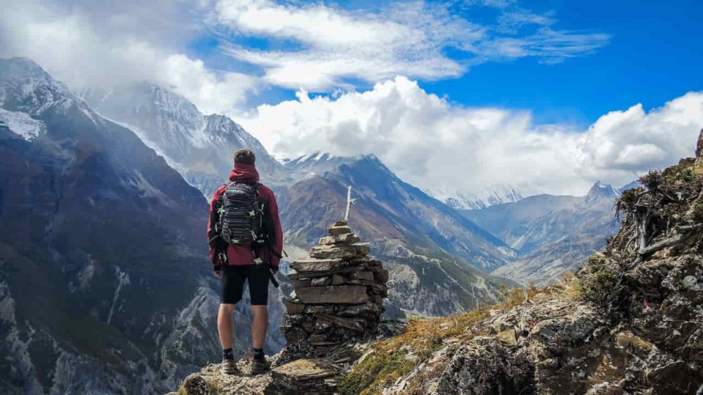 Man standing on mountain top