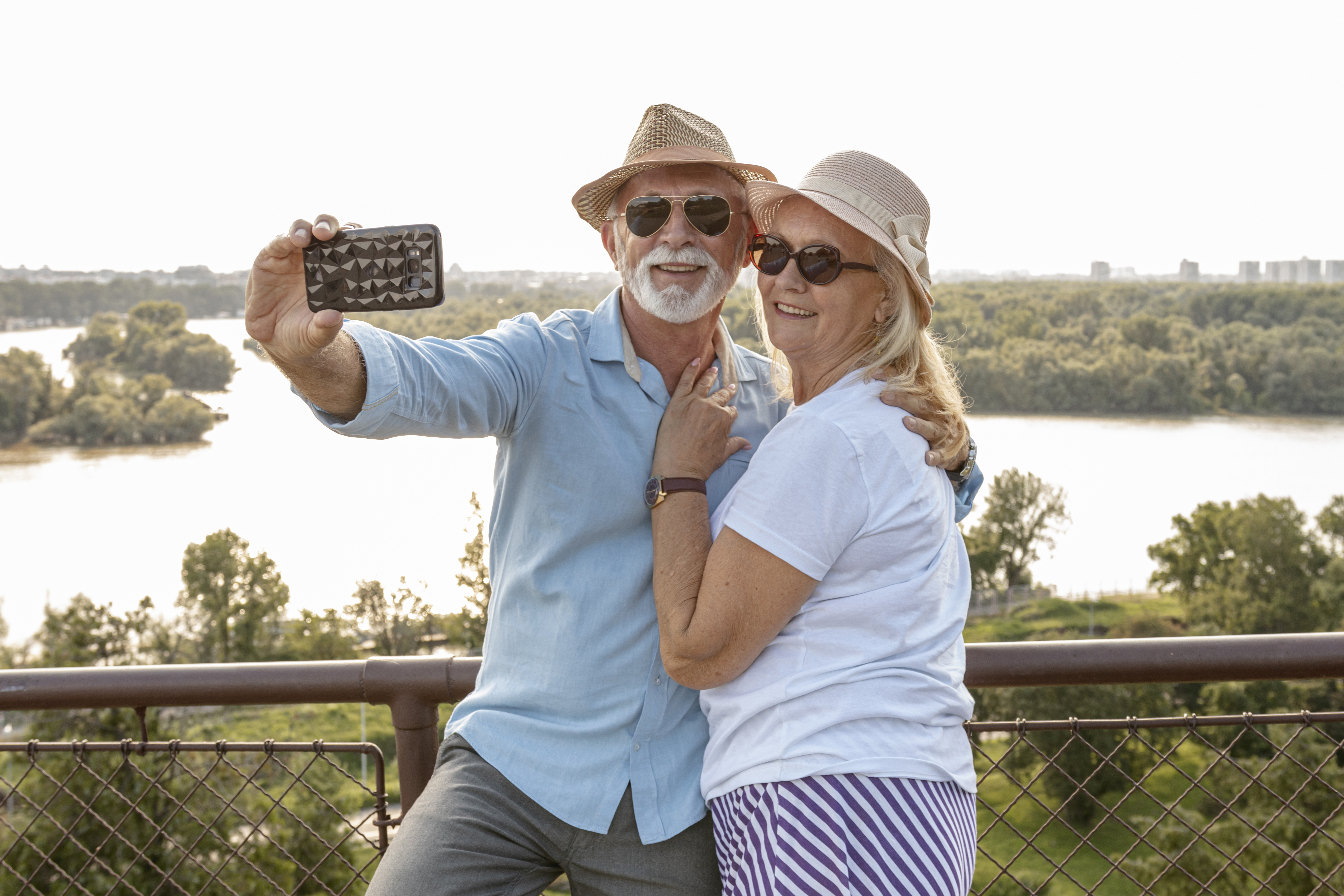 A cute old couple taking a selfie