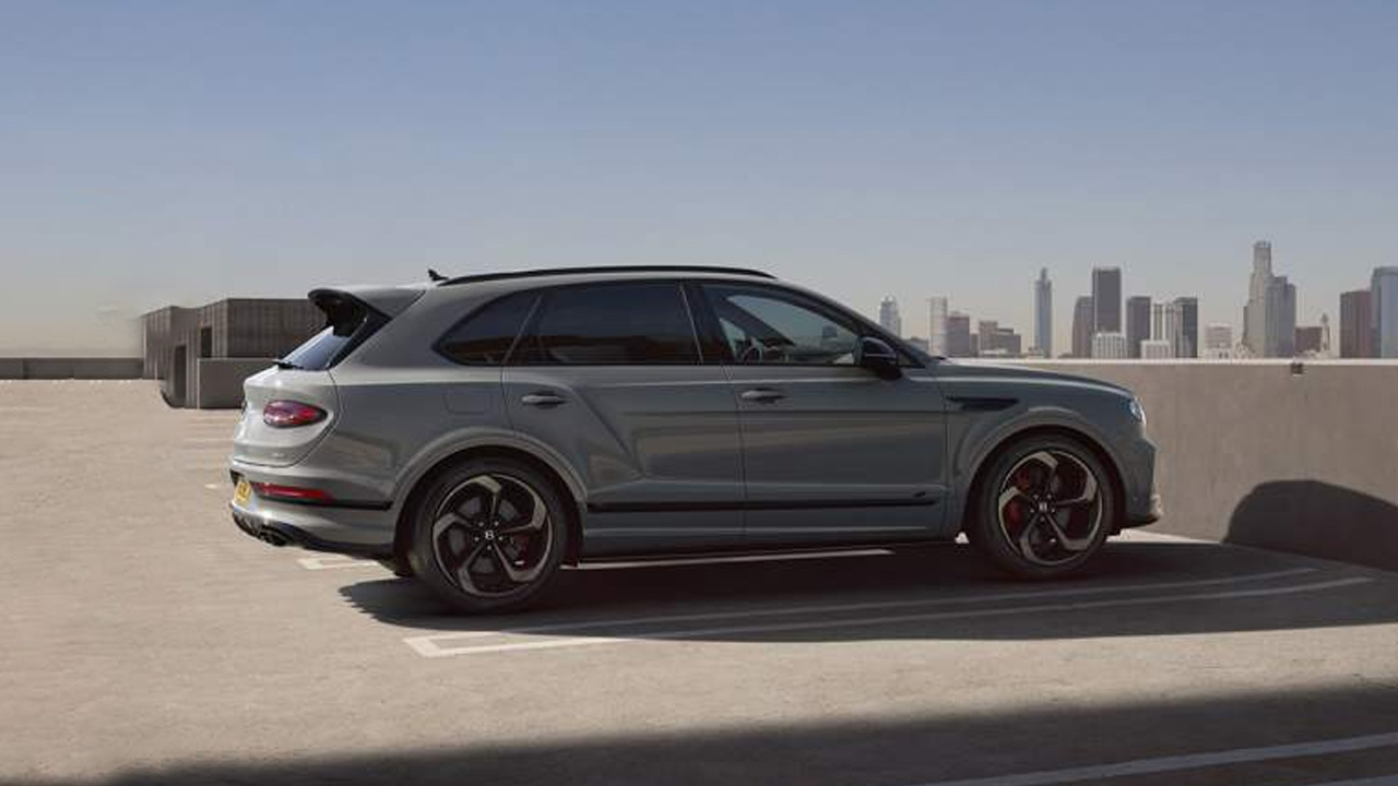 a dark grey Bentley Bentayga parked outside