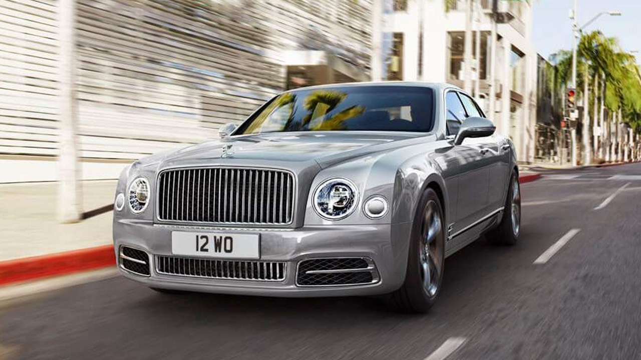 a grey Bentley Mulsanne is running on road