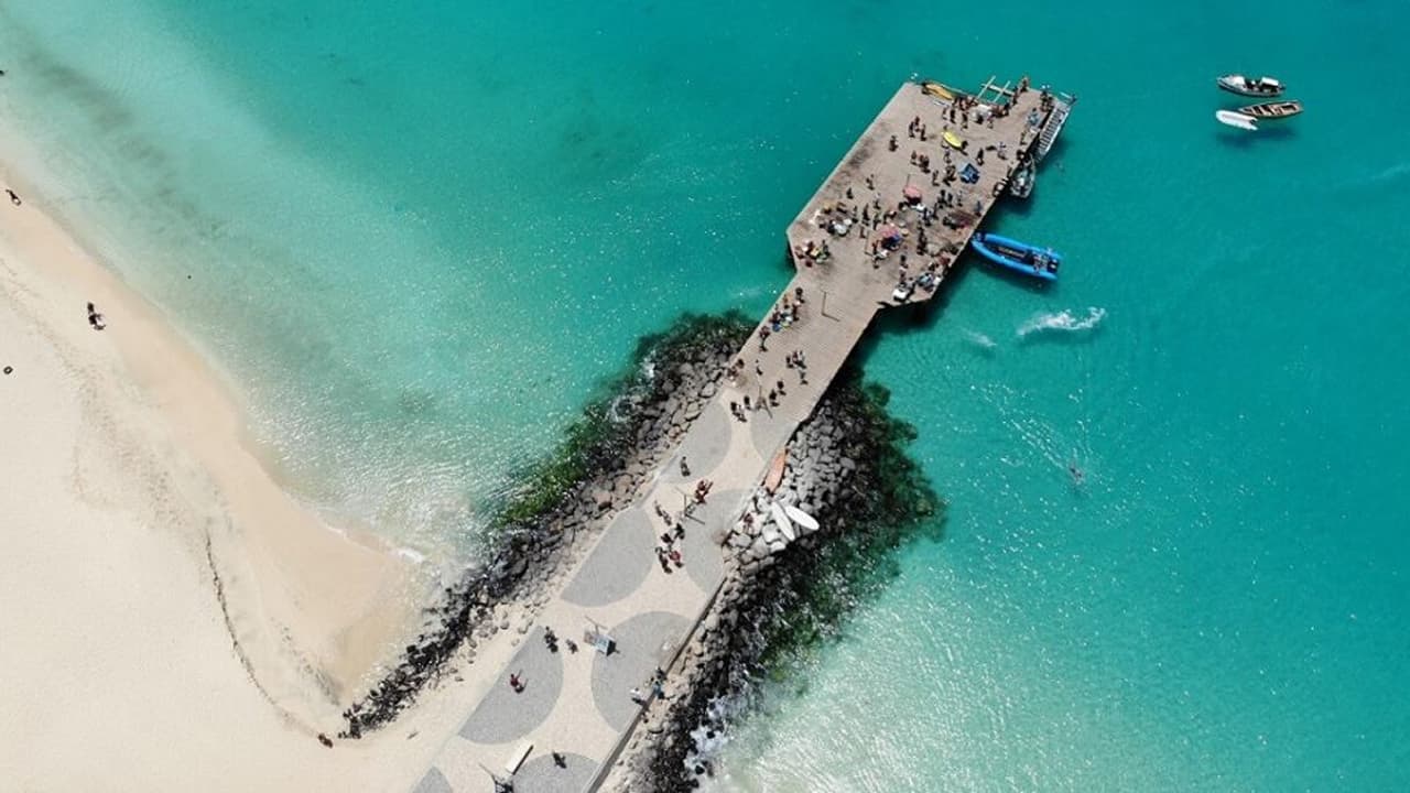 Sal, an island in Cape Verde, where many people are going towards their boats