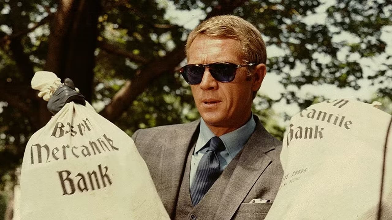 Thomas Crown is holding two bags