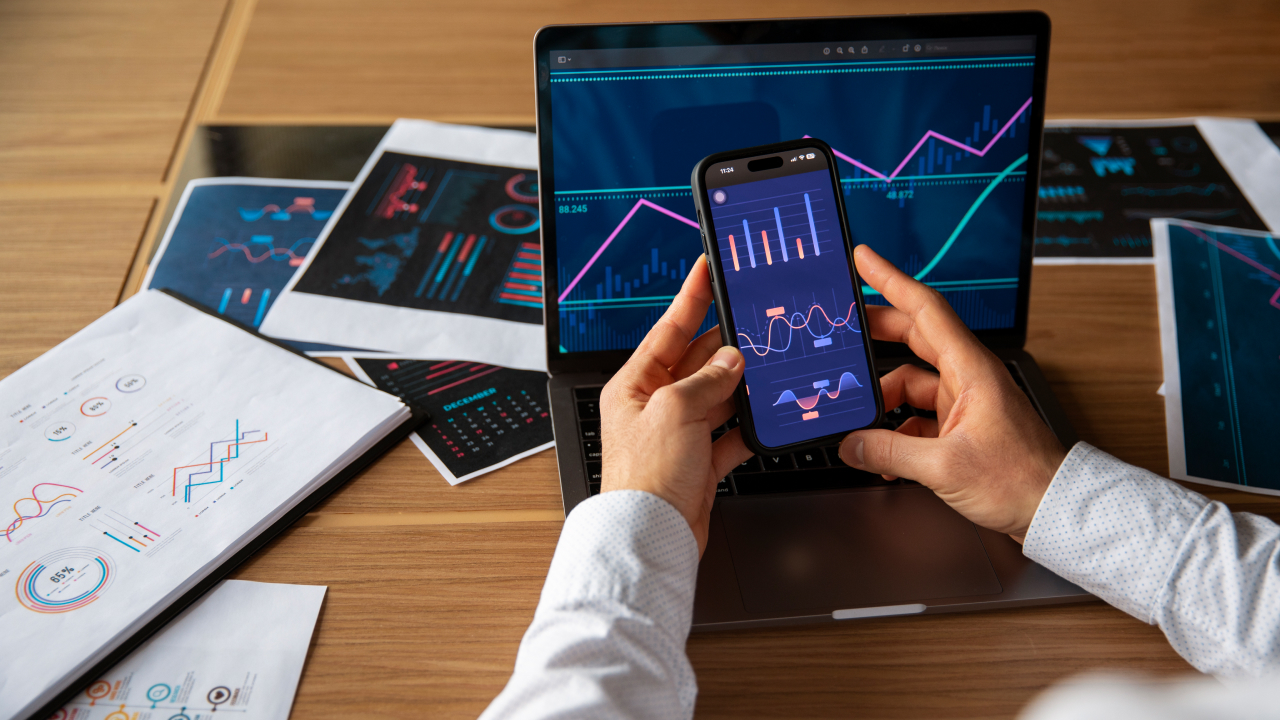 office worker using finance graph