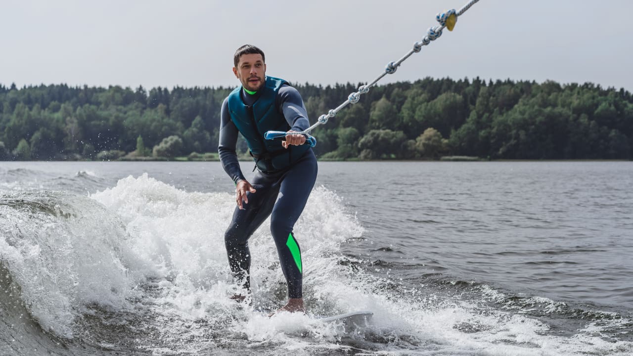 A man is doing water skiing