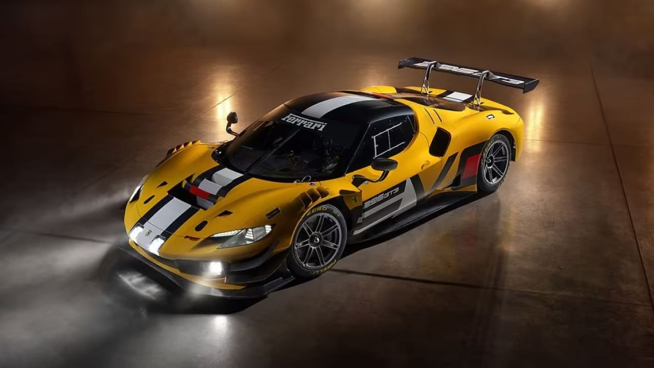 Ferrari headlights are on while standing in a basement