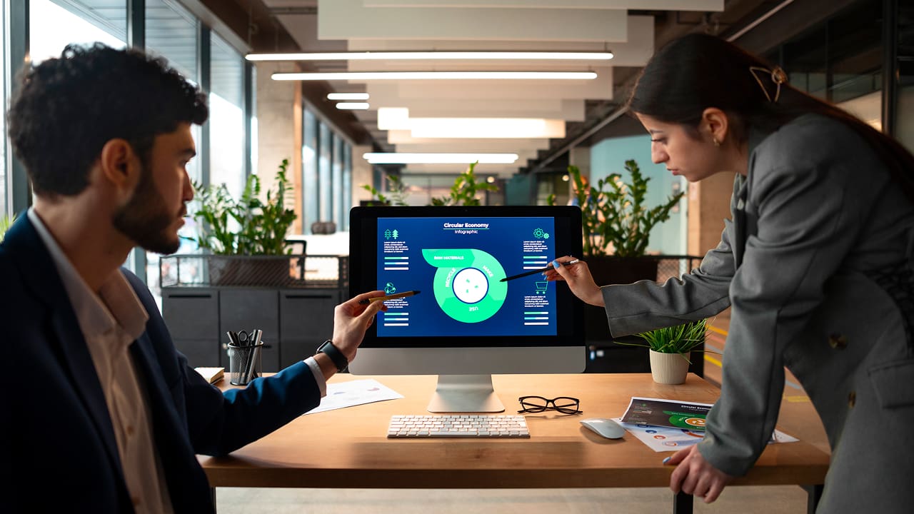 Two people are analyzing a financial graph