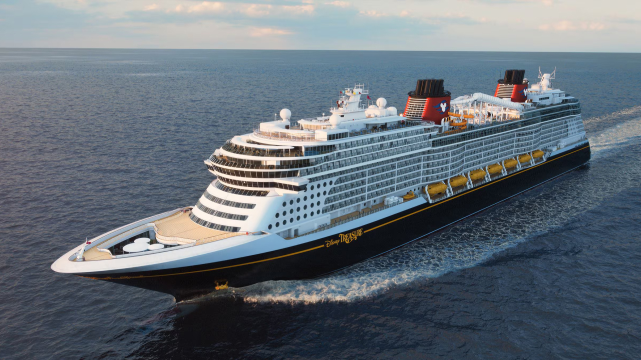 A disney cruise line sailing on the sea, perfect for families