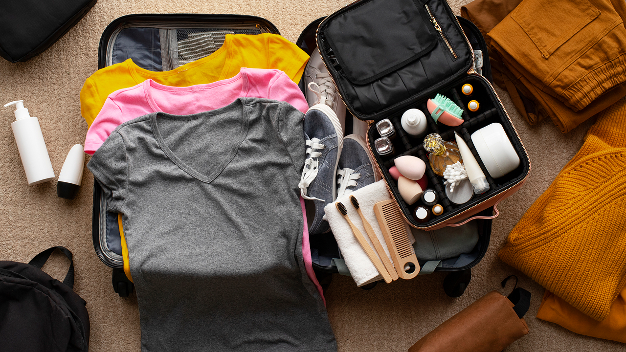 A solo travel bag full of clothes and other essentials 