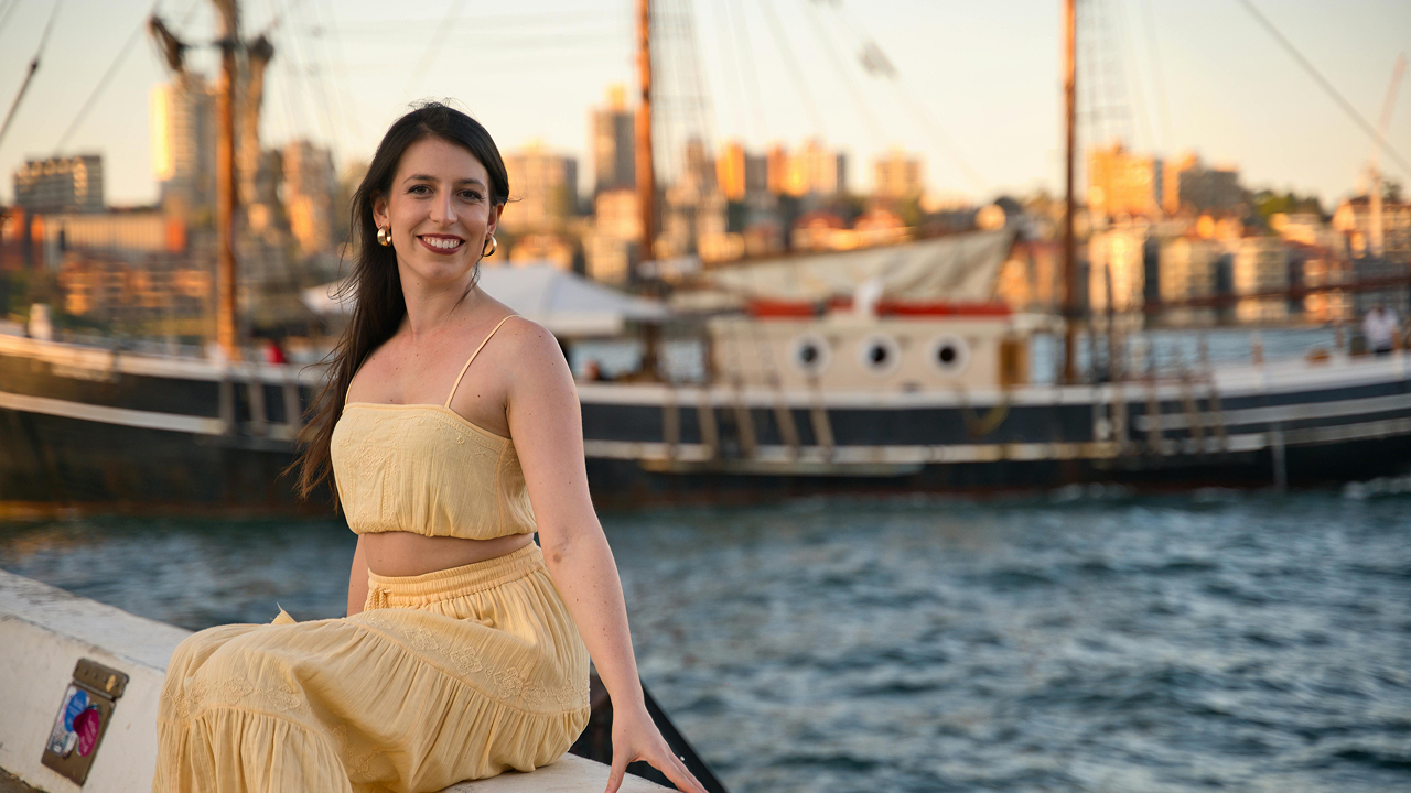 Woman sitting and posing for a picture