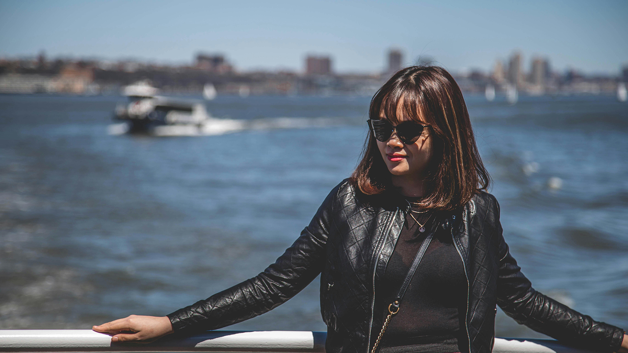 Women wearing black leather jacket on a cruise