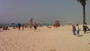 A beach where many people are enjoying, a perfect spot for solo travel