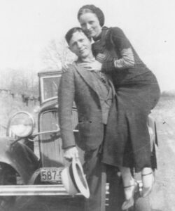 A man holding a lady and posing for a picture