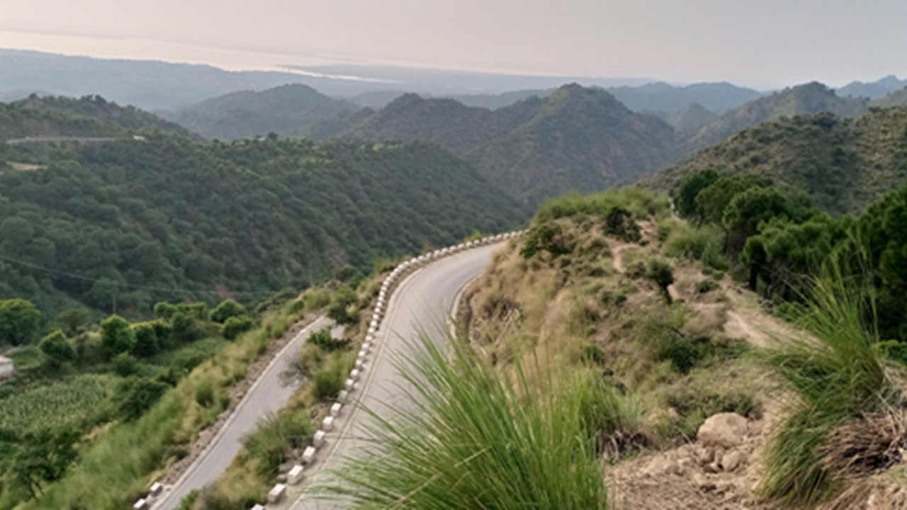 A beautiful view of mountains and roads, a perfect spot for solo travel