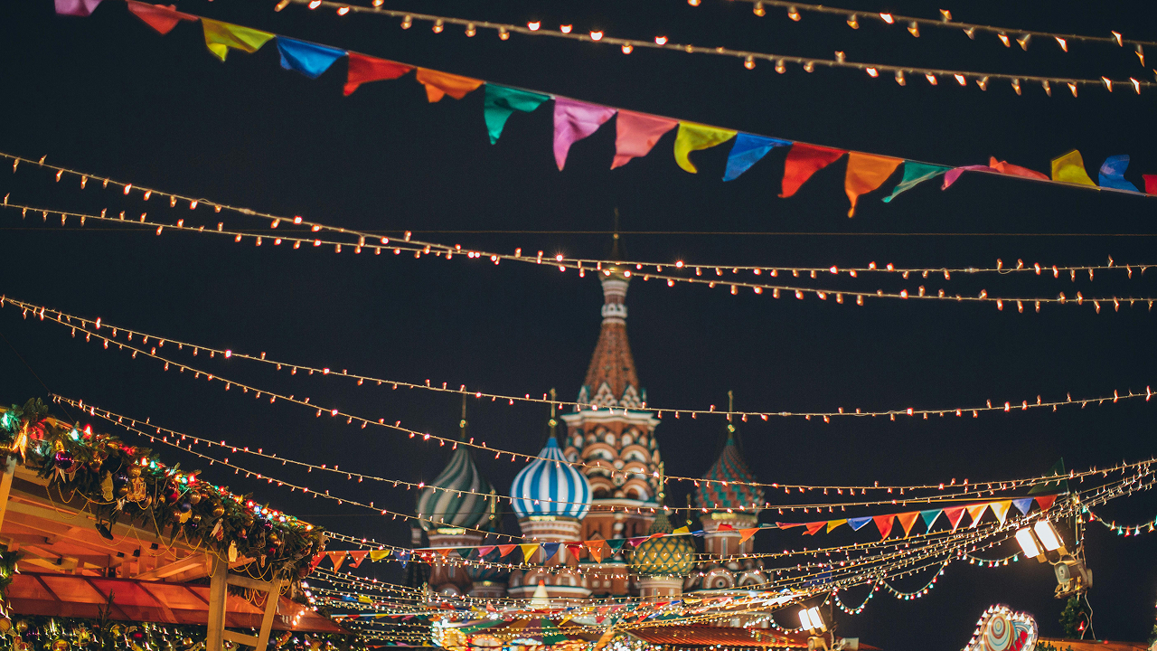 A nighttime picture of colorful strings of Edinburgh festive lights