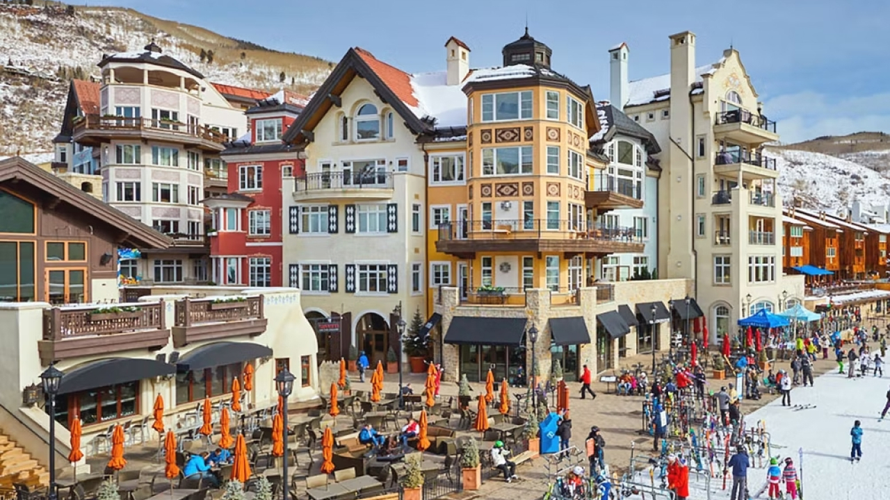 Colorful buildings at a snowy ski resort village in Colorado