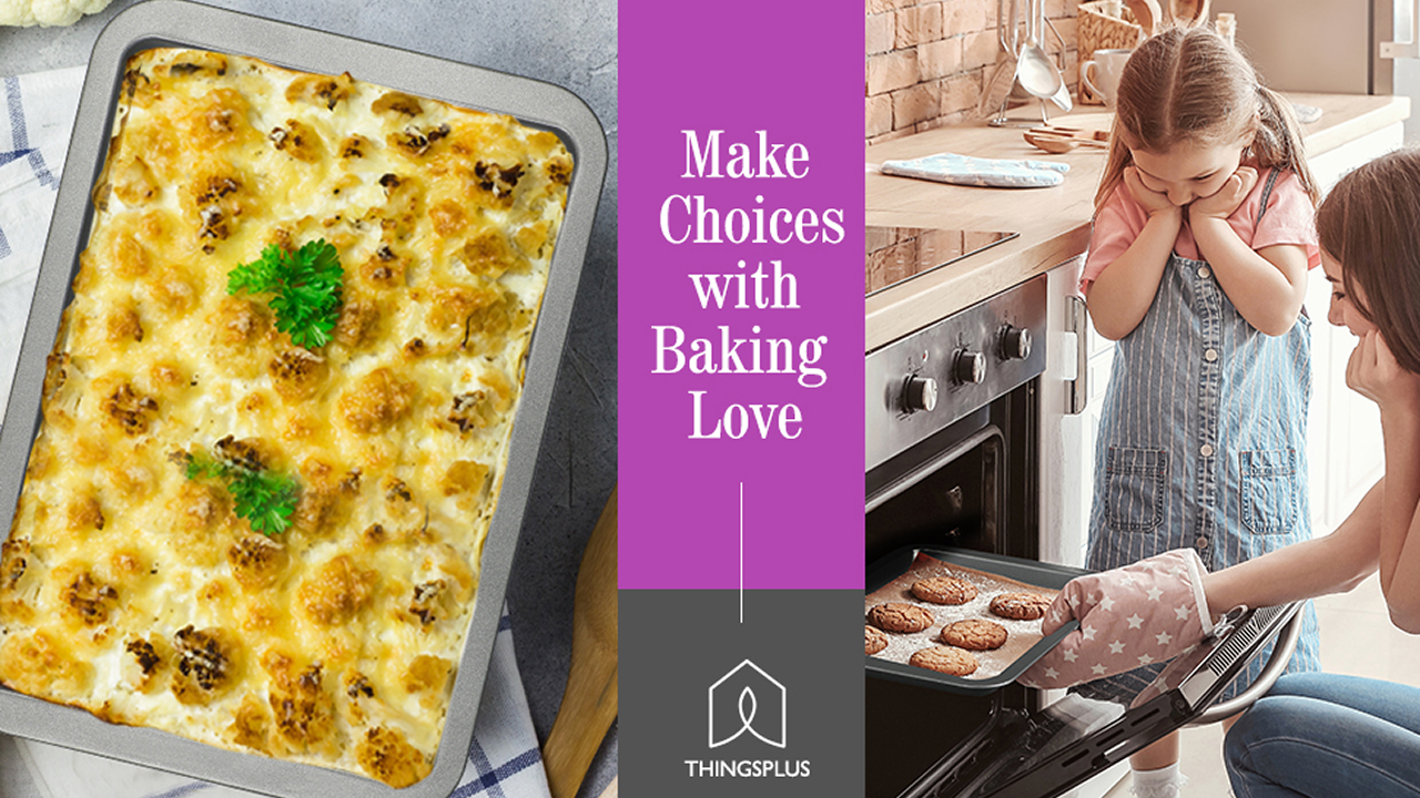 Abaking tray and a mother taking cookies out of the oven with her child