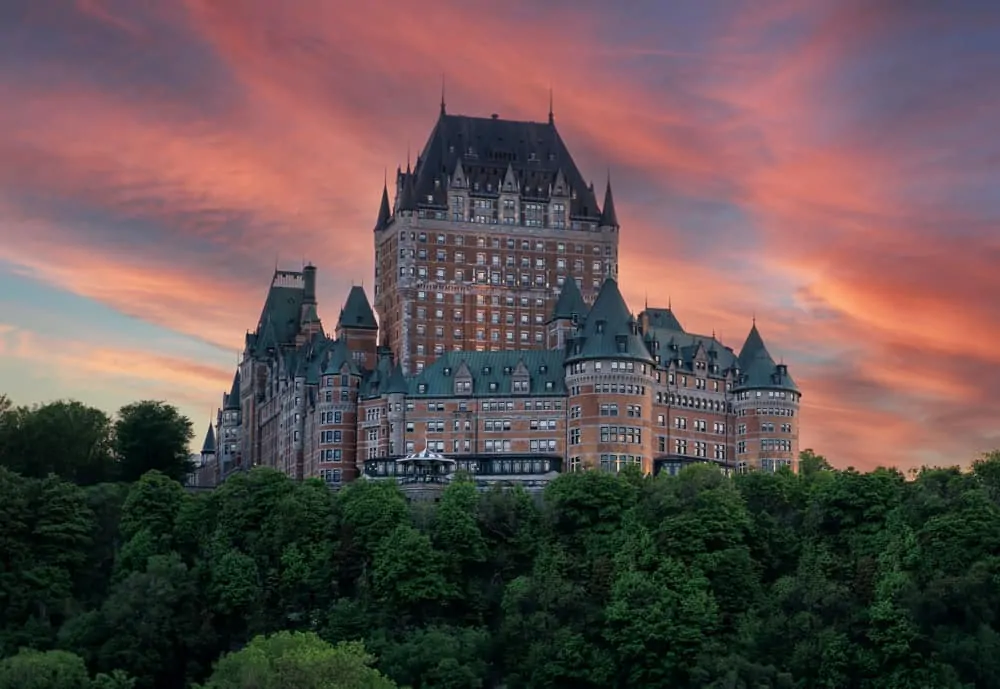 Quebec City Canada Famous building in trees a great solo travel destiations