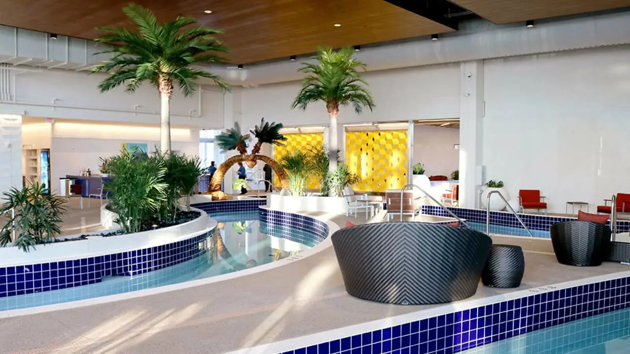An indoor pool lounge with a beautiful view