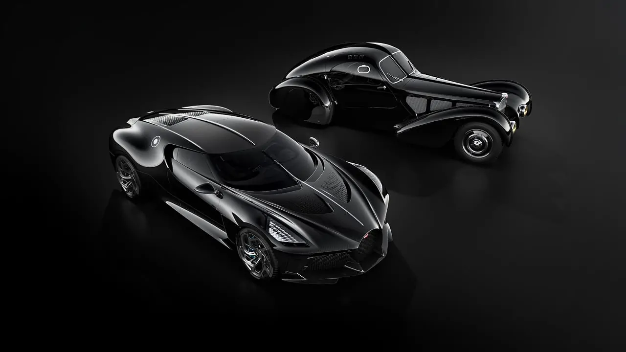 A top view of two cars with a black surface