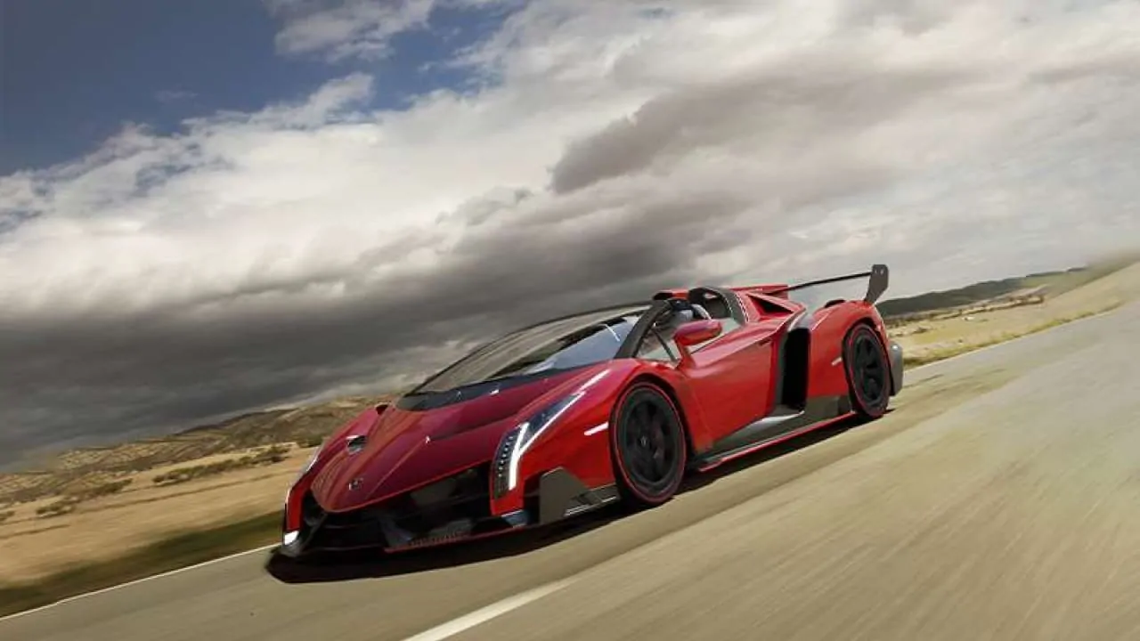 A Lamborghini Veneno is speeding along the road