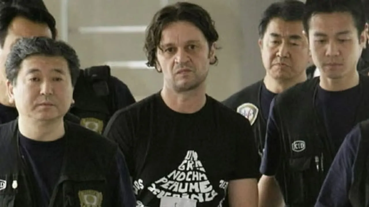 A group of cops taking the member of pink panthers
